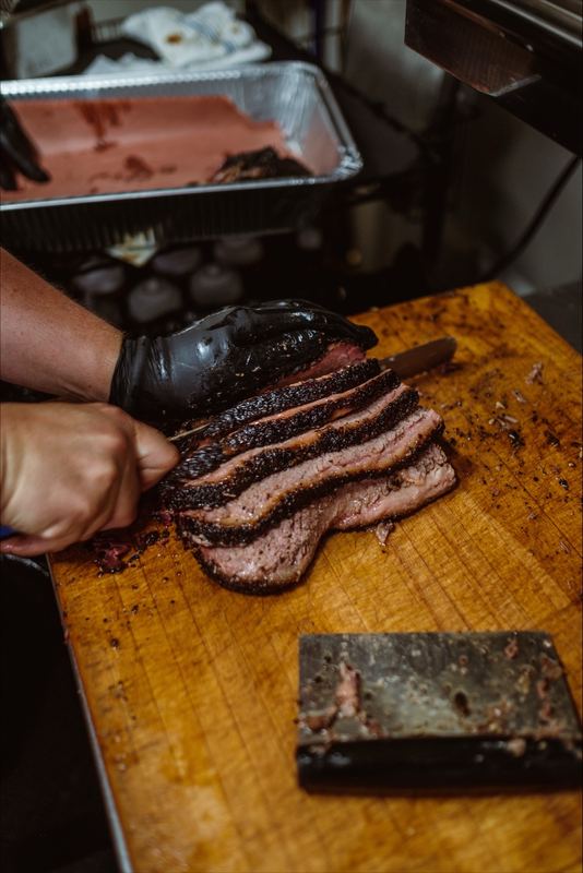 Slicing brisket on the cutting board